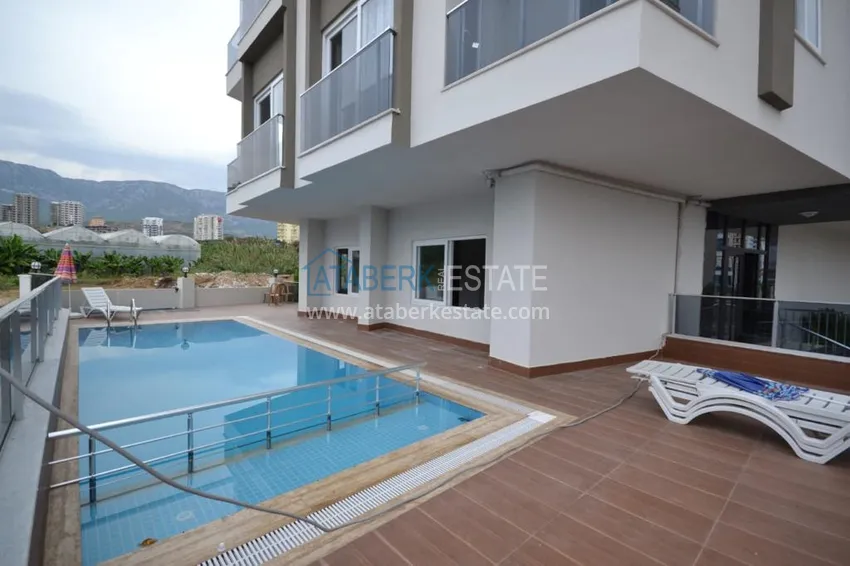 Квартира в Махмутларе двухкомнатная с чистовой отделкой. Новостройки Алании 2 