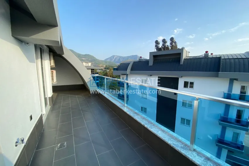 Приобрести Пентхаус – дуплекс в Оба меблированный в молодом современном комплексе с видом на горы 21 