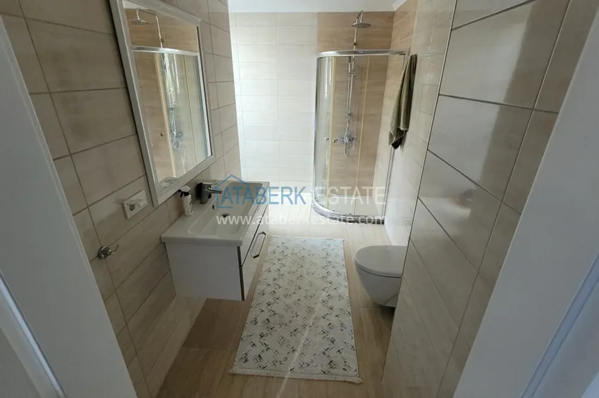 Приобрести Дуплекс в Алании – район Каргыджак, двухуровневый с выходом в сад 31 