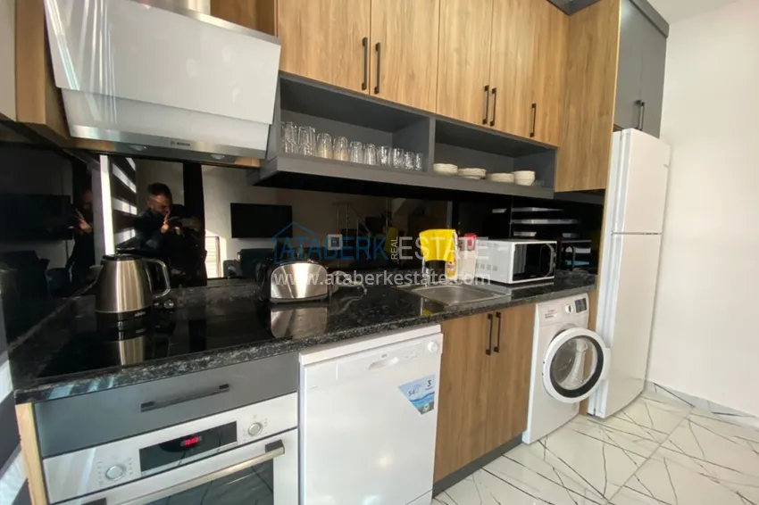 Приобрести Пентхаус – дуплекс в Оба меблированный в молодом современном комплексе с видом на горы 6 