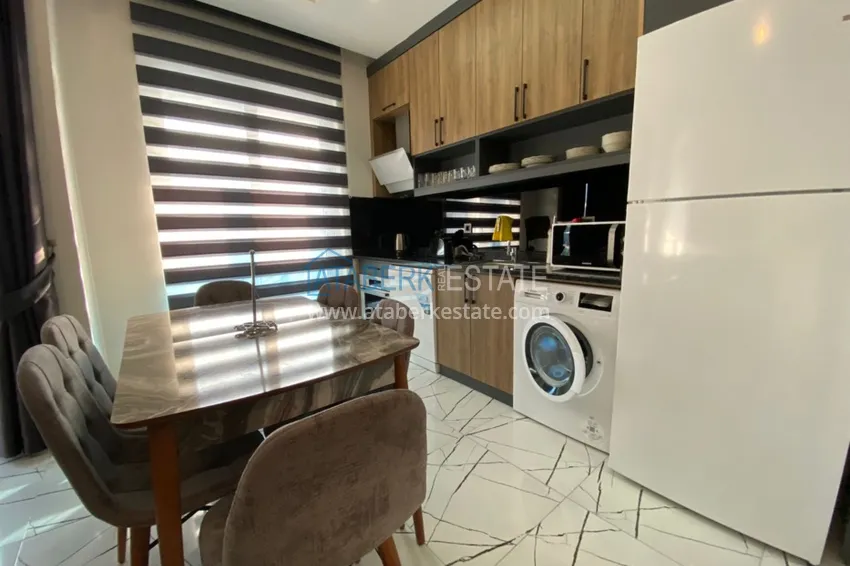 Приобрести Пентхаус – дуплекс в Оба меблированный в молодом современном комплексе с видом на горы 7 