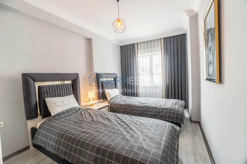 Приобрести Квартира в Махмутларе с мебелью и видом на горы в благоустроенном комплексе 9 