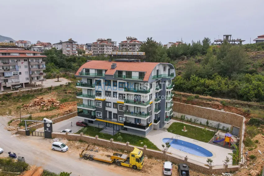 Садовый дуплекс в Алании – район Оба с чистовой отделкой и новой мебелью 1 