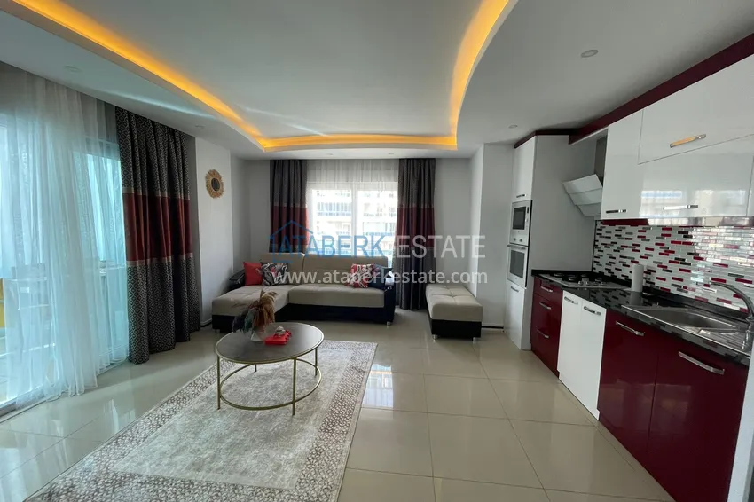 Приобрести Квартира с мебелью и застекленным балконом в Махмутларе 1 