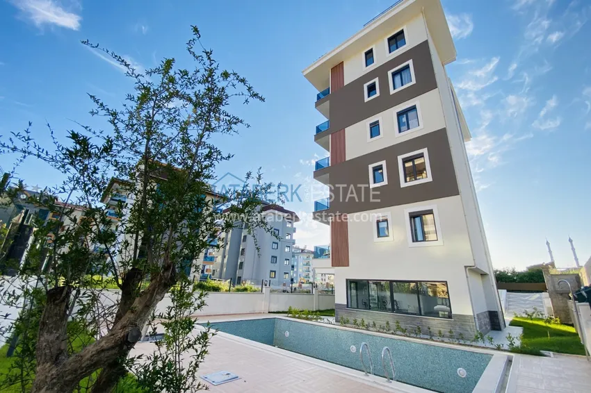 Квартиры в районе Кестель с чистовой отделкой, видом на горы и море - новостройка 1