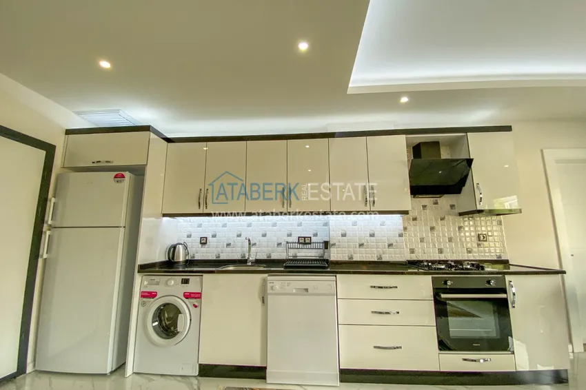 Приобрести Садовый дуплекс в Алании – район Оба с чистовой отделкой и новой мебелью 12 