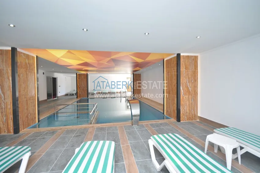 Дуплекс в Махмутларе с мебелью и застекленным балконом в благоустроенной резиденции 18 