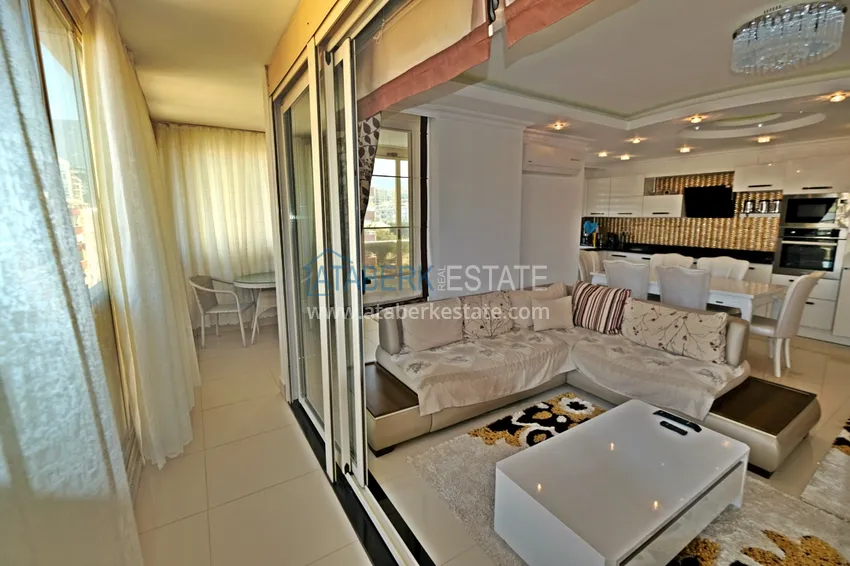 Приобрести Квартира в центре Махмутлара с мебелью и двумя лоджиями 12 