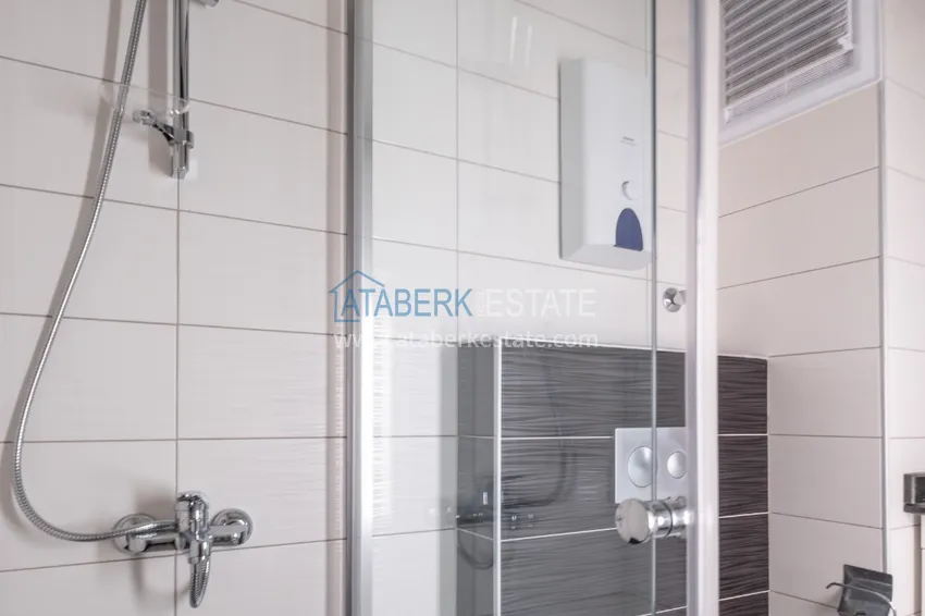 Приобрести Квартира двухкомнатная с видом на море в комплексе с частным пляжем в Авсалларе 10 