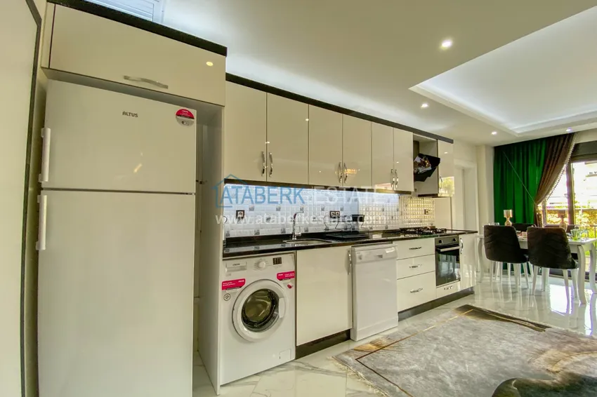 Приобрести Садовый дуплекс в Алании – район Оба с чистовой отделкой и новой мебелью 14 