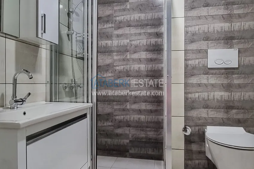 Приобрести Квартира в Махмутларе со стильным интерьером, отдельной кухней и видом на море 13 