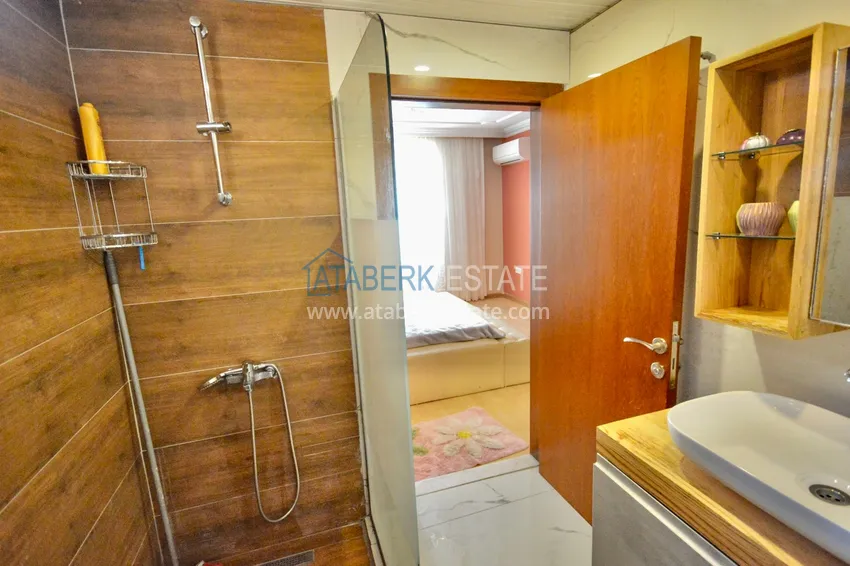 Приобрести Дуплекс в центре Алании в комплексе с бассейном и видом на горы 12 