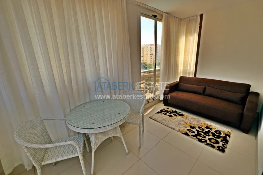 Приобрести Квартира в центре Махмутлара с мебелью и двумя лоджиями 13 