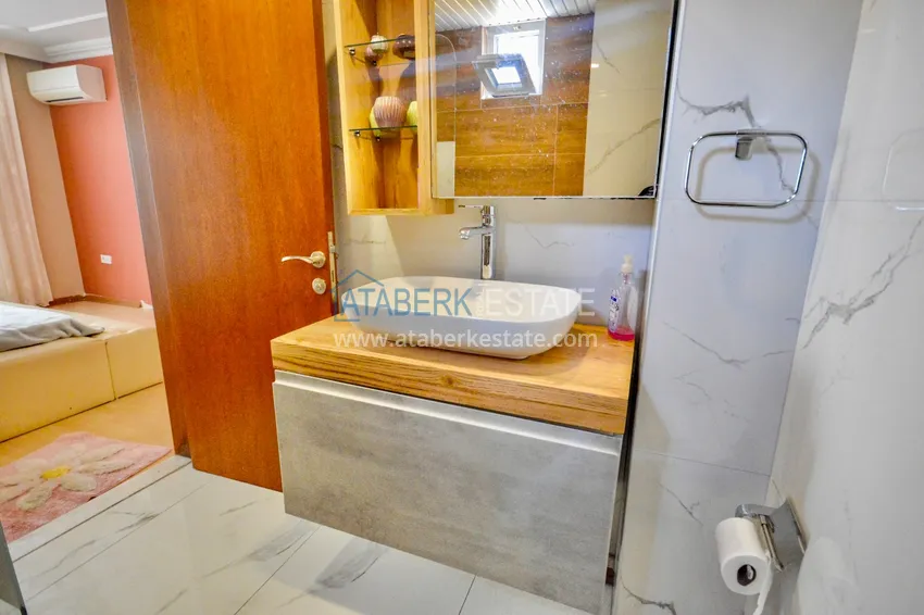 Приобрести Дуплекс в центре Алании в комплексе с бассейном и видом на горы 13 