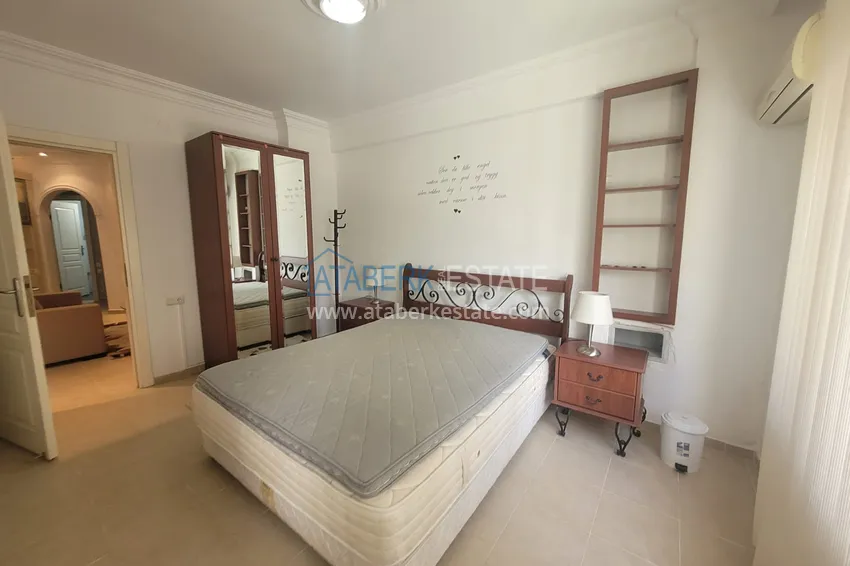 Приобрести Квартира в Алании - район Тосмур, трехкомнатная с мебелью в уютном комплексе 12 