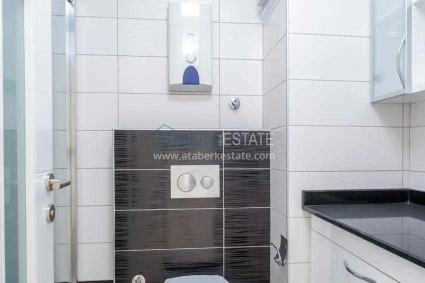 Приобрести Квартира двухкомнатная с видом на море в комплексе с частным пляжем в Авсалларе 11 