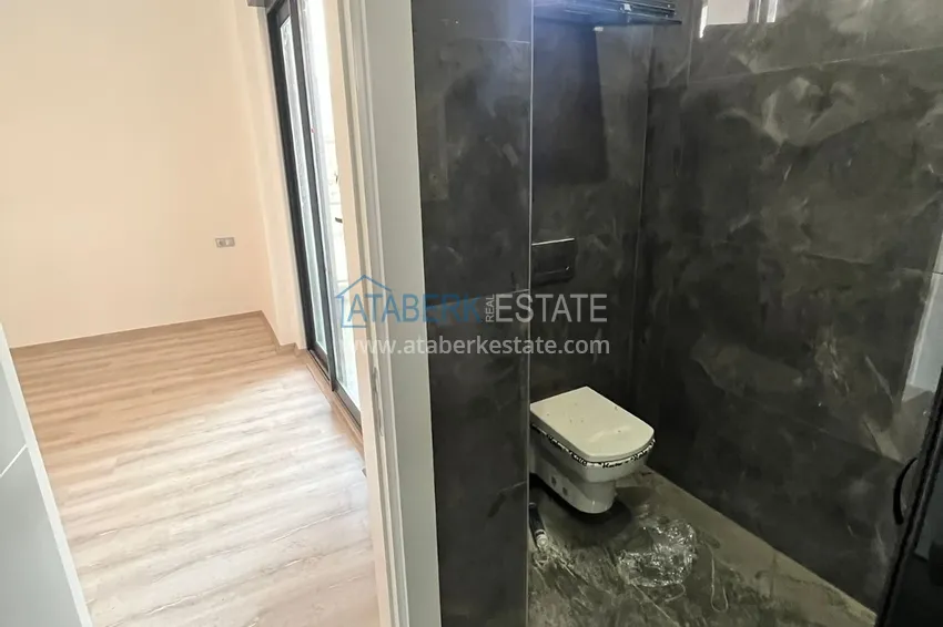 Приобрести Квартира в Алании – район Оба с высококачественной чистовой отделкой и отдельной кухней  11 