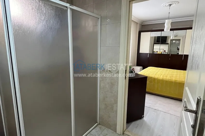 Приобрести Квартира в центре Алании, трехкомнатная с мебелью и отдельной кухней 12 