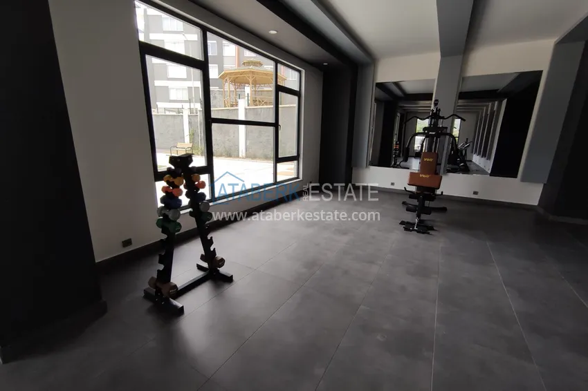 Квартира в Махмутларе со стильным интерьером, отдельной кухней и видом на море 15 