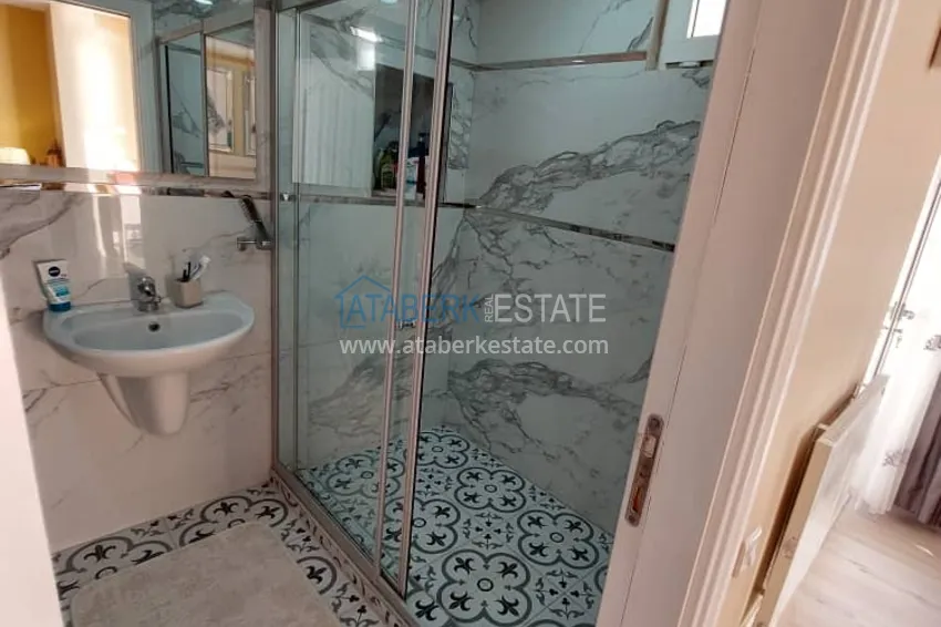 Приобрести Квартира на первой береговой линии в Махмутларе с мебелью 13 