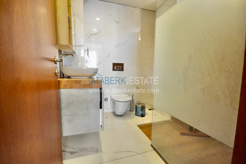 Приобрести Дуплекс в центре Алании в комплексе с бассейном и видом на горы 14 