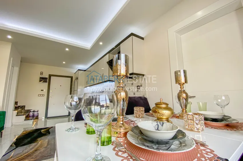 Приобрести Садовый дуплекс в Алании – район Оба с чистовой отделкой и новой мебелью 16 