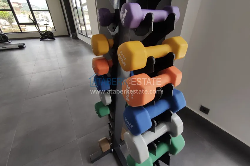 Квартира в Махмутларе со стильным интерьером, отдельной кухней и видом на море 16 