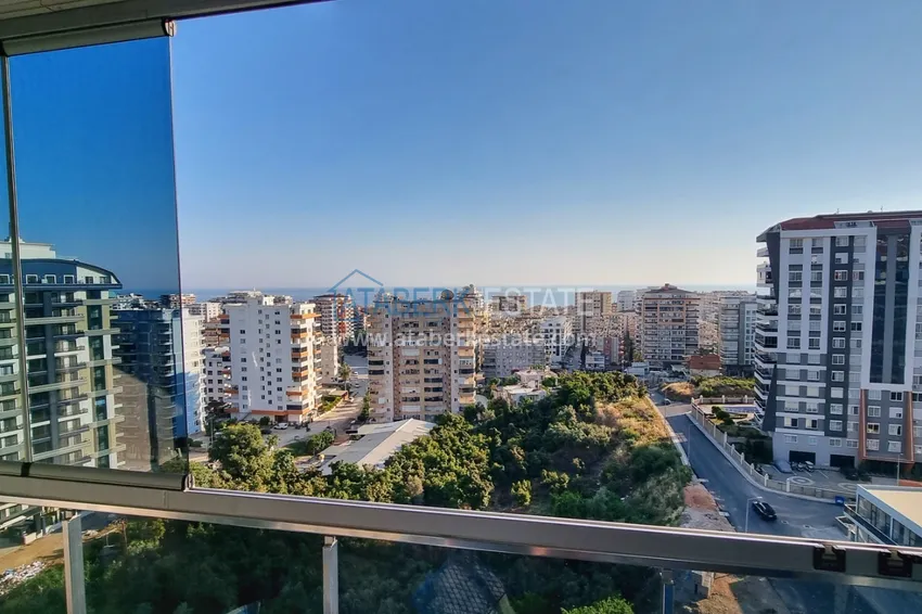 Приобрести Квартира в Махмутларе со стильным интерьером, отдельной кухней и видом на море 15 