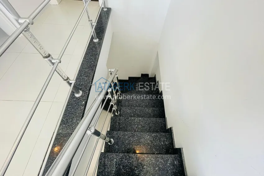 Приобрести Двухуровневый пентхаус в Алании район Кестель с мебелью 16