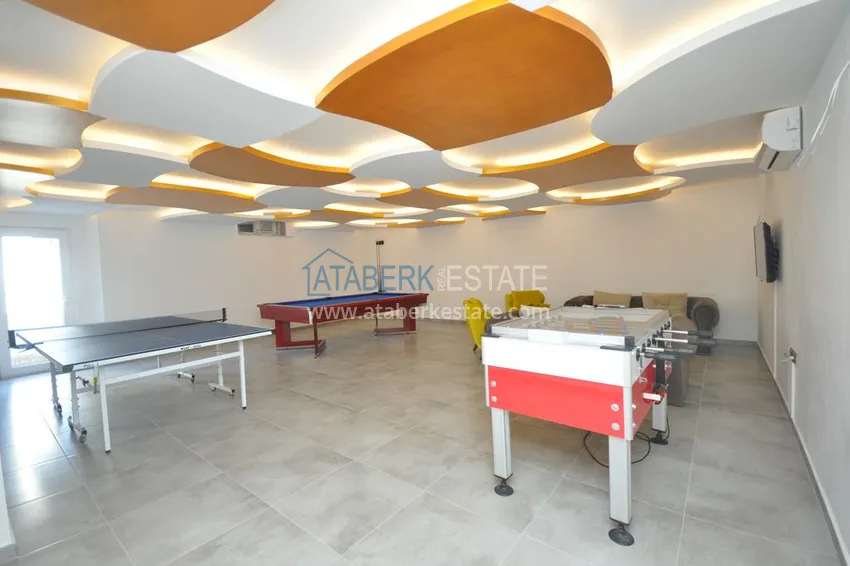 Дуплекс в Махмутларе с мебелью и застекленным балконом в благоустроенной резиденции 22 