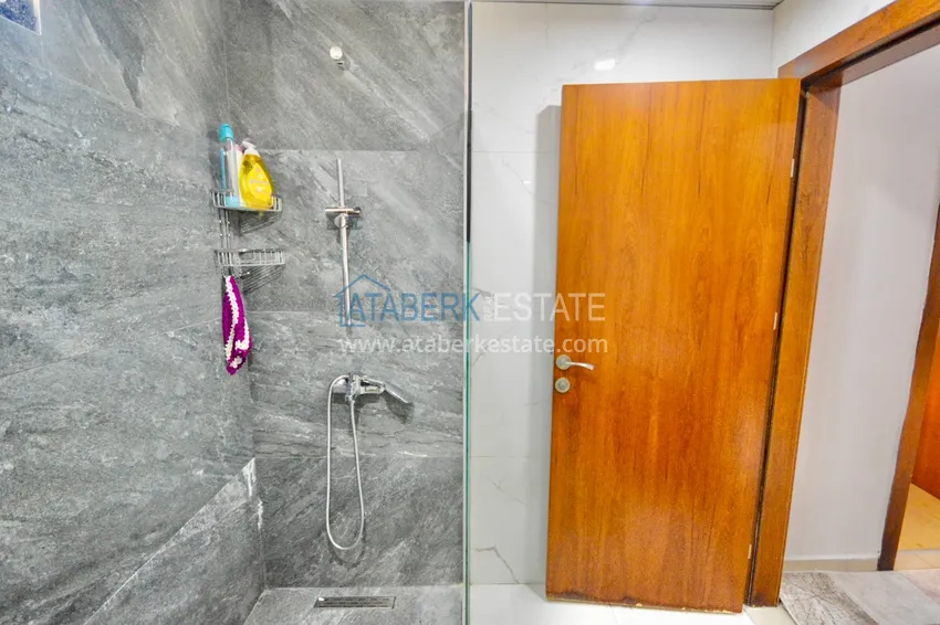 Приобрести Дуплекс в центре Алании в комплексе с бассейном и видом на горы 15 