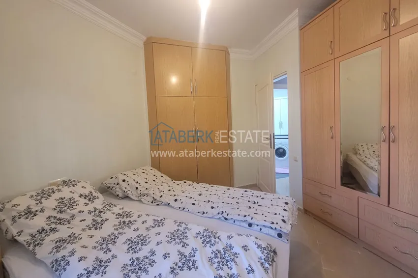 Приобрести Квартира в Алании - район Тосмур, трехкомнатная с мебелью в уютном комплексе 15 