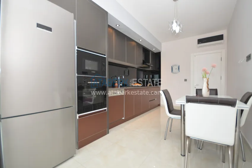 Приобрести Квартира Махмутларе меблированная с отдельной кухней и частичным видом на море 14 