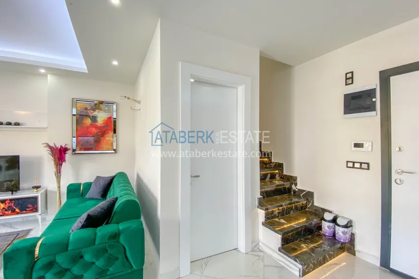 Приобрести Садовый дуплекс в Алании – район Оба с чистовой отделкой и новой мебелью 18 