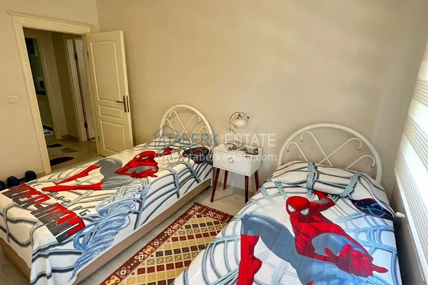 Приобрести Квартира в центре Алании, трехкомнатная с мебелью и отдельной кухней 15 