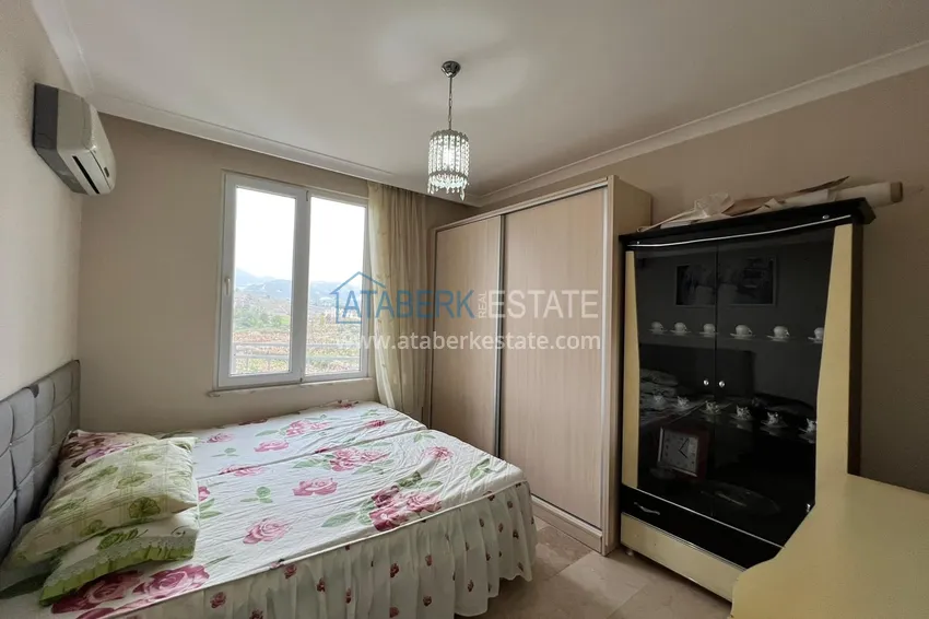 Приобрести Квартира в Махмутларе с мебелью, видом на горы в жилом комплексе 14 