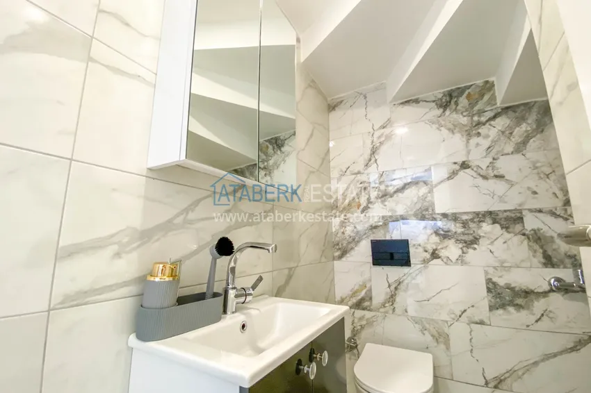 Приобрести Садовый дуплекс в Алании – район Оба с чистовой отделкой и новой мебелью 19 