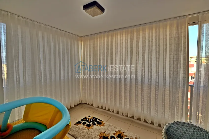 Приобрести Квартира в центре Махмутлара с мебелью и двумя лоджиями 17 