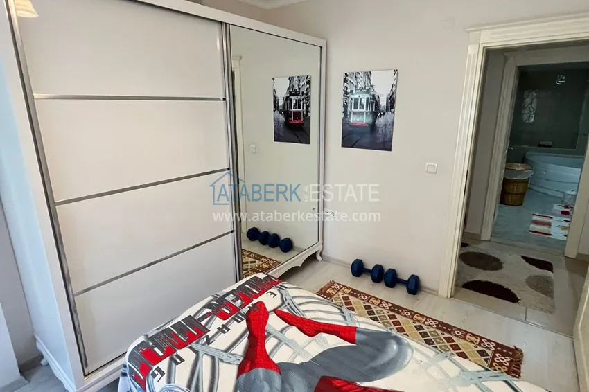 Приобрести Квартира в центре Алании, трехкомнатная с мебелью и отдельной кухней 16 