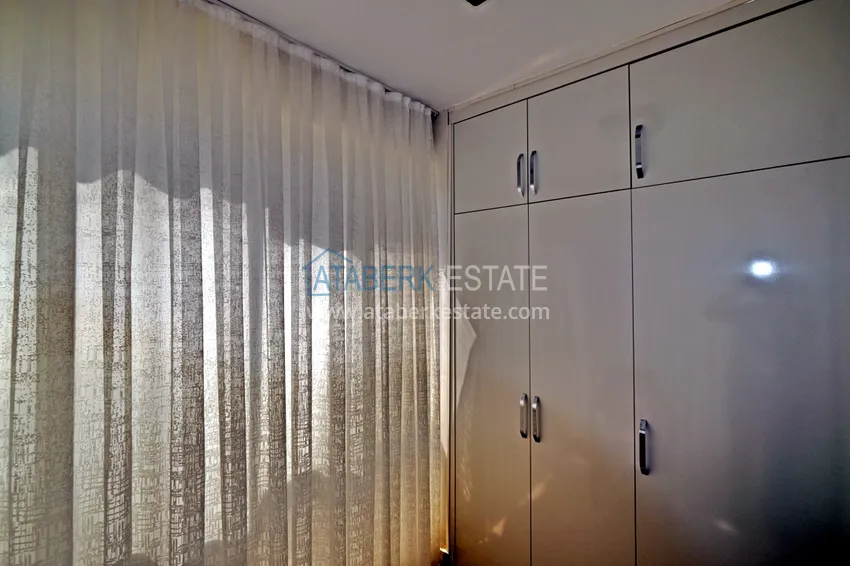 Приобрести Квартира в центре Махмутлара с мебелью и двумя лоджиями 19 