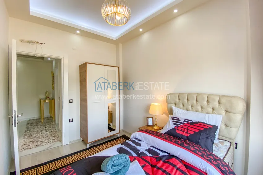 Приобрести Садовый дуплекс в Алании – район Оба с чистовой отделкой и новой мебелью 26 