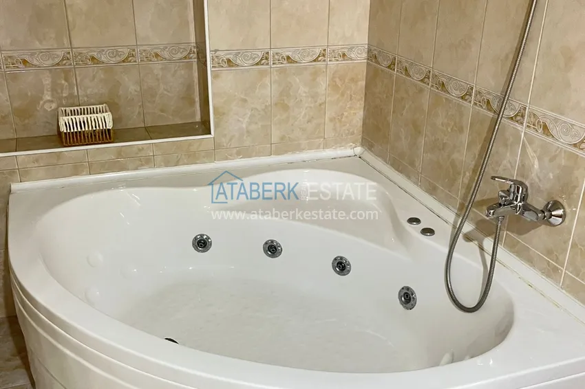 Приобрести Квартира в центре Алании, трехкомнатная с мебелью и отдельной кухней 19 