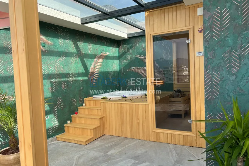 Приобрести Пентхаус-дуплекс в Махмутларе меблированный, с сауной и видом на море 18 