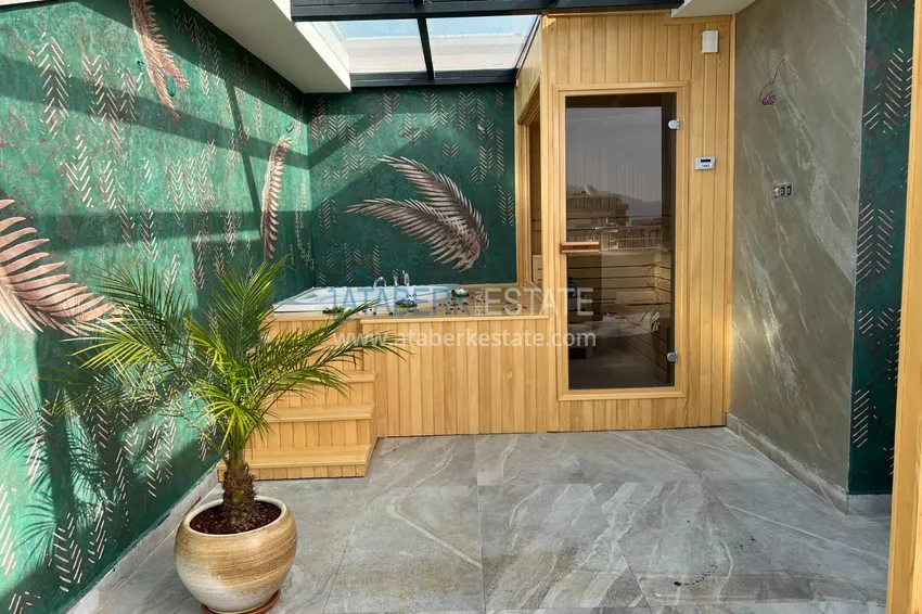 Приобрести Пентхаус-дуплекс в Махмутларе меблированный, с сауной и видом на море 19 