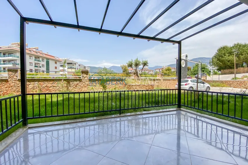 Приобрести Садовый дуплекс в Алании – район Оба с чистовой отделкой и новой мебелью 1 