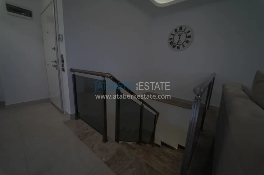 Приобрести Дуплекс в Махмутларе с мебелью и застекленным балконом в благоустроенной резиденции 1 