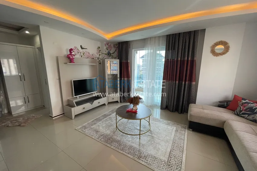 Приобрести Квартира с мебелью и застекленным балконом в Махмутларе 2 