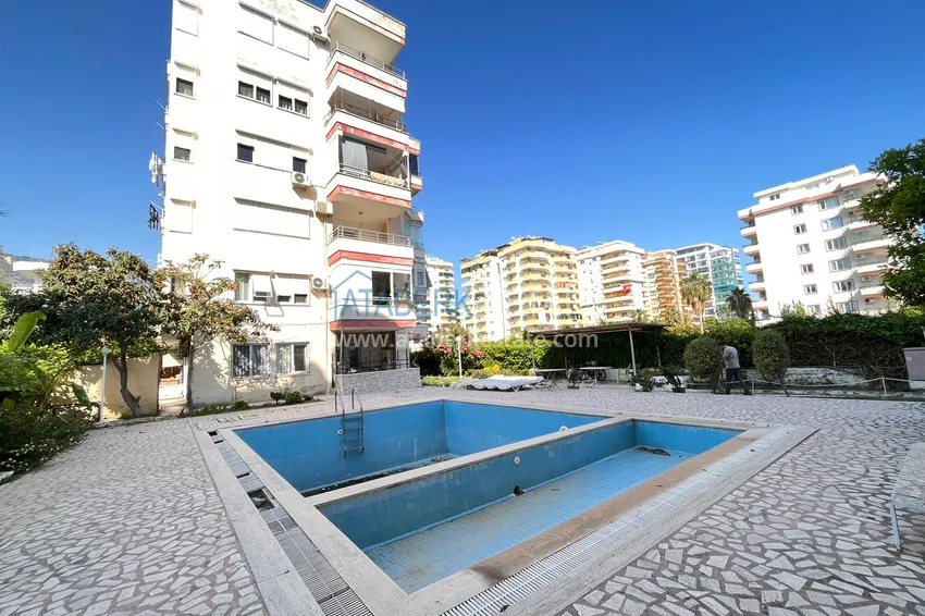 Квартира в Махмутларе с мебелью, отдельной кухней и застекленными балконами  1 