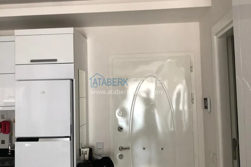 Приобрести Квартира в Авсалларе с мебелью в элитном комплексе у пляжа Инджекум 1 