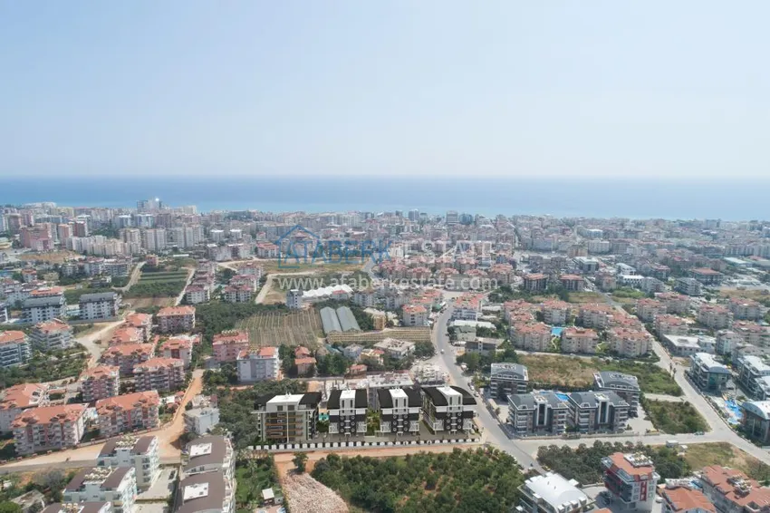 Квартира в Алании – район Оба с высококачественной чистовой отделкой и отдельной кухней  1 